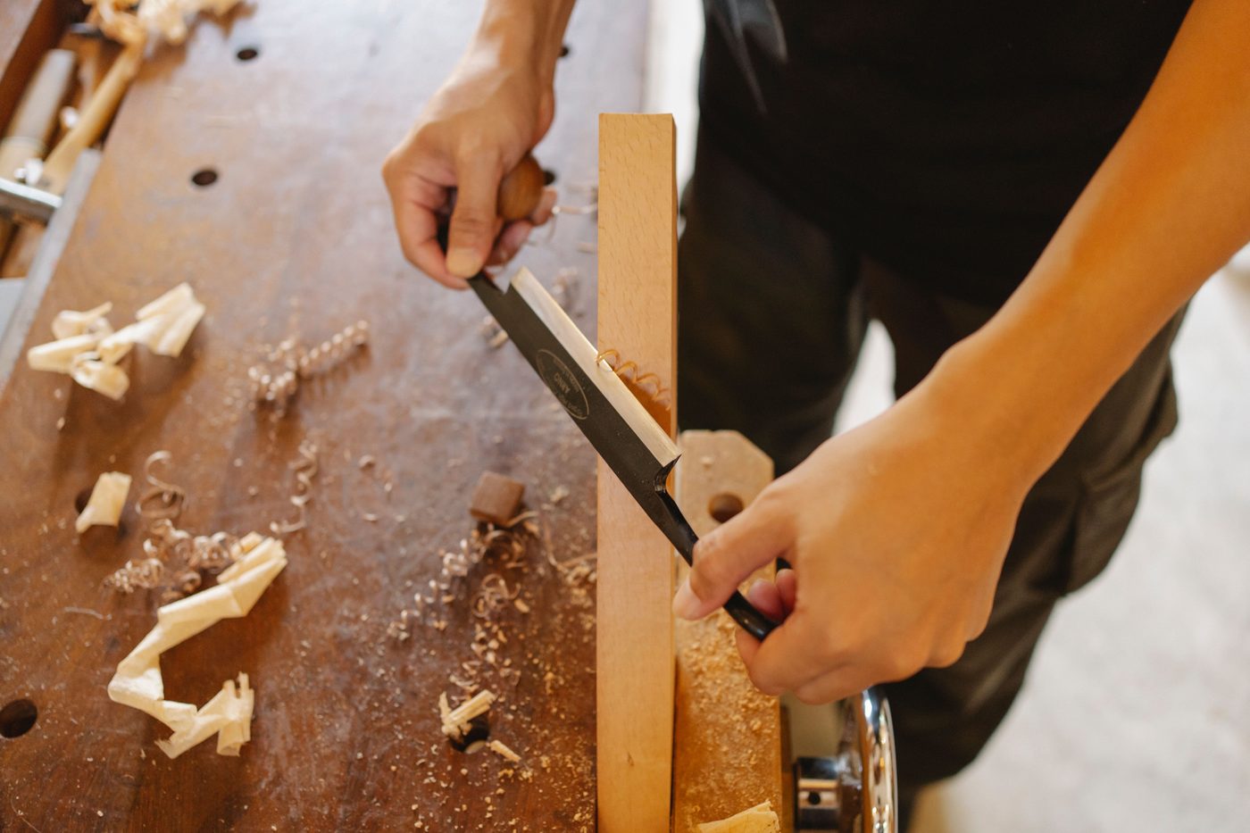 Shaping timber by hand on the workbench