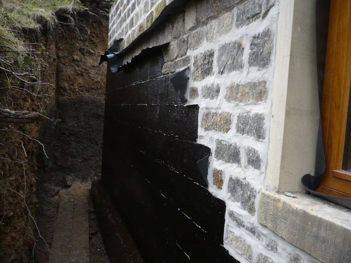 Damp wall caused by failed cavity insulation