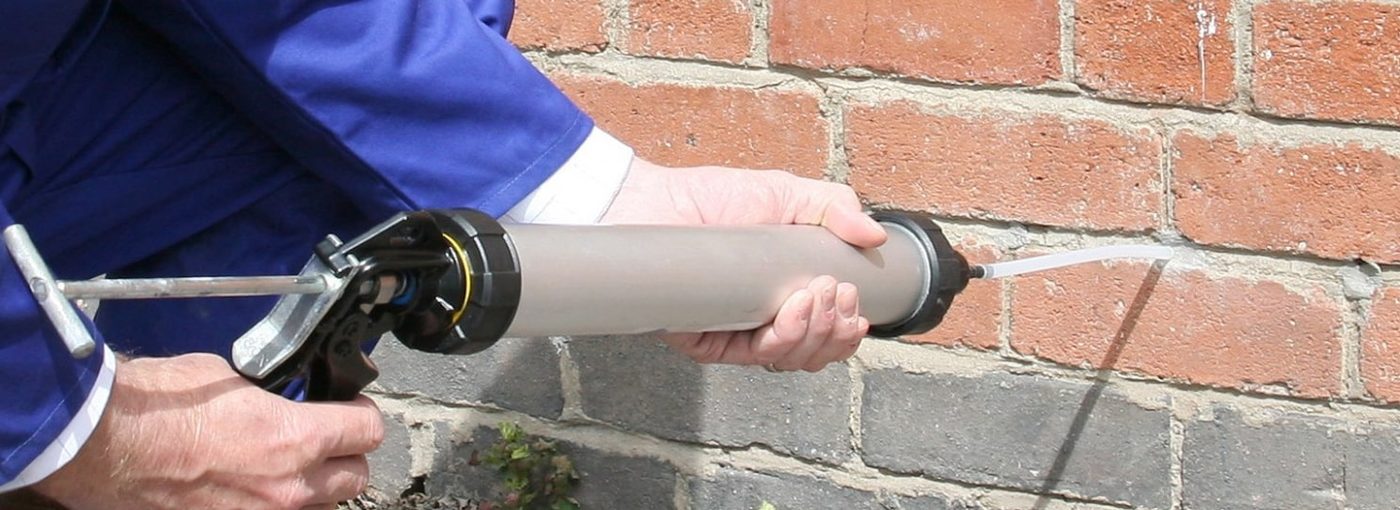 Damp treatment to a wall