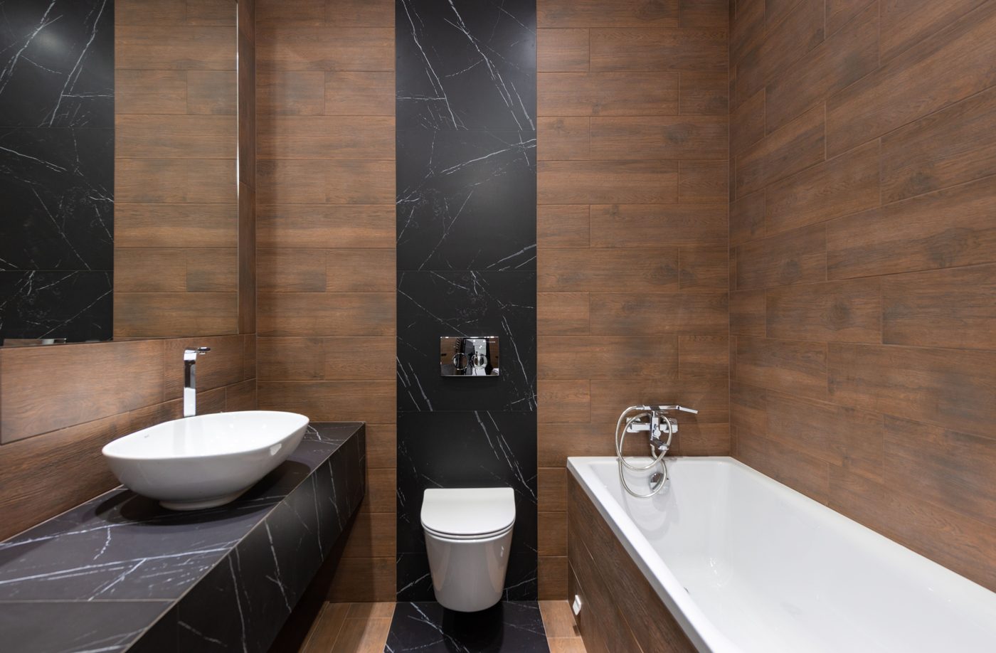 Modern bathroom installation with wood and marble finishes